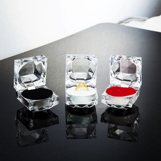 These crystal-cut ring boxes provide an elegant showcase for your most valued rings. With a luxurious velvet interior, they are designed to enhance and protect. Available in three distinct colors, they are perfect for adding