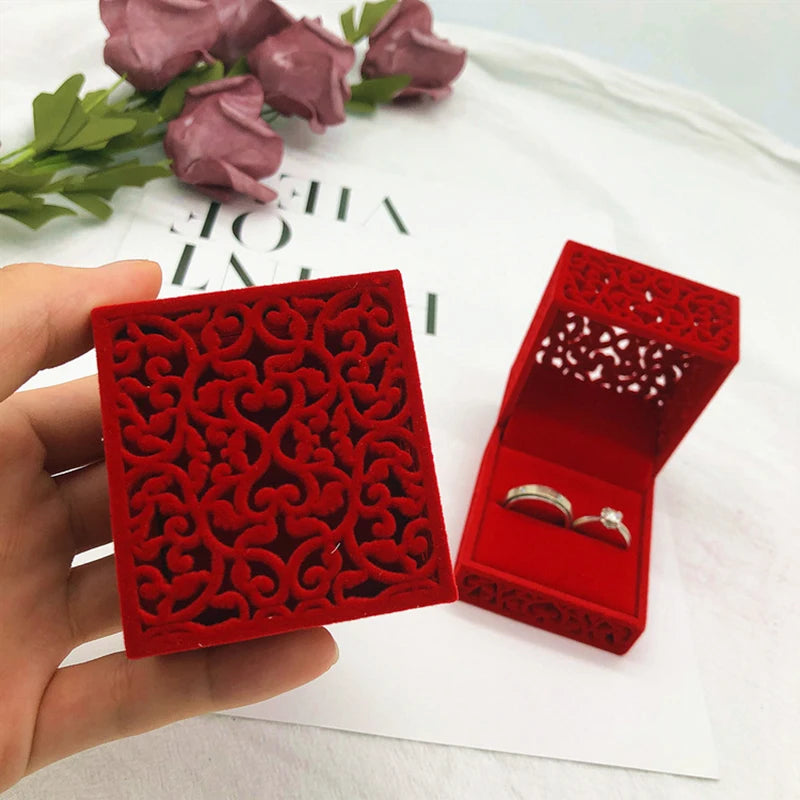 An elegant ring box with intricate patterns that exude luxury and style. Ideal for adding a touch of sophistication to any special moment.