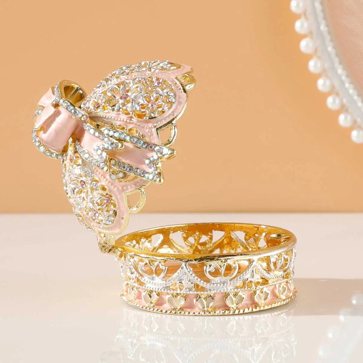 Crown of Elegance and Luxury: Ornately crafted ring boxes to add a luxurious touch to any occasion. Available in two colors.